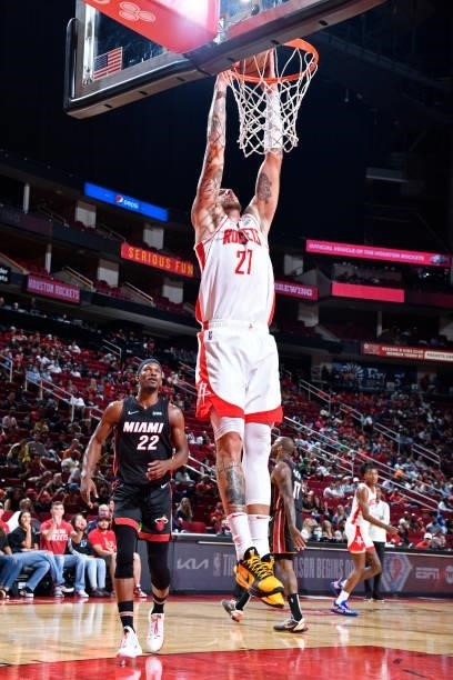 Daniel Theis of the Houston Rockets dunks the ball during a preseason game against the Miami Heat on October 7, 2021 at the Toyota Center in Houston,...