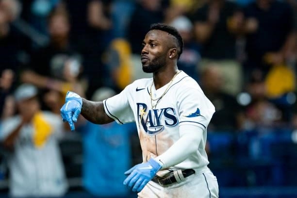 Randy Arozarena of the Tampa Bay Rays reacts after stealing home plate after during the seventh inning of game one of the 2021 American League...