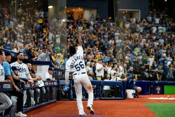 Randy Arozarena of the Tampa Bay Rays gives a curtain call after stealing home plate after during the seventh inning of game one of the 2021 American...