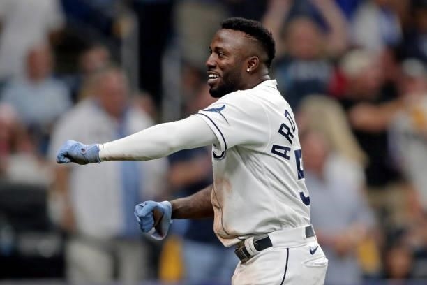 Randy Arozarena of the Tampa Bay Rays celebrates after stealing home in the bottom of the seventh inning during Game 1 of the ALDS between the Boston...