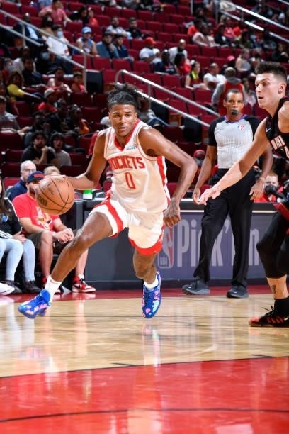 Jalen Green of the Houston Rockets drives to the basket during a preseason game against the Miami Heat on October 7, 2021 at the Toyota Center in...