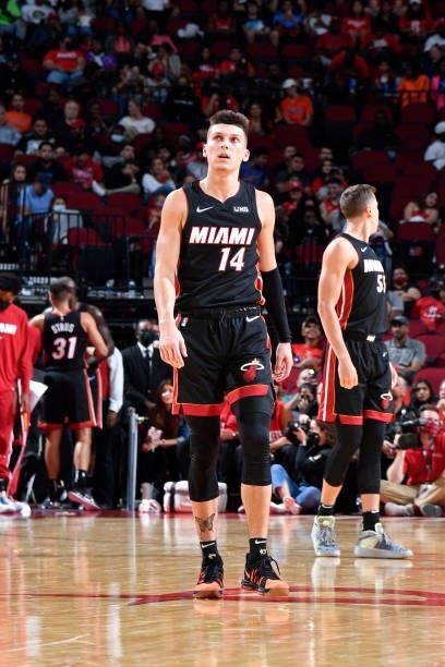 Tyler Herro of the Miami Heat looks on during a preseason game against the Houston Rockets on October 7, 2021 at the Toyota Center in Houston, Texas....
