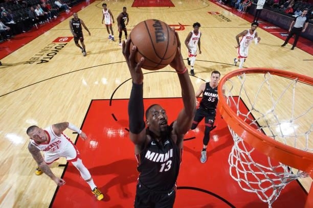 Bam Adebayo of the Miami Heat dunks the ball during a preseason game against the Houston Rockets on October 7, 2021 at the Toyota Center in Houston,...
