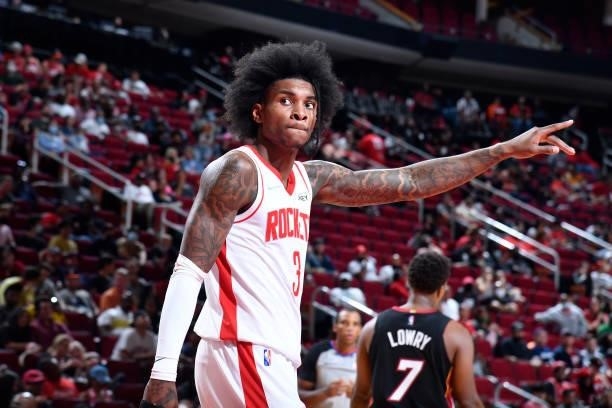 Kevin Porter Jr. #3 of the Houston Rockets points during a preseason game against the Miami Heat on October 7, 2021 at the Toyota Center in Houston,...