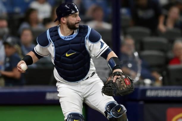 Mike Zunino of the Tampa Bay Rays reacts after catching a pop fly in the top of the ninth inning during Game 1 of the ALDS between the Boston Red Sox...