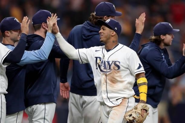 Wander Franco of the Tampa Bay Rays celebrates with his teammates after the Rays defeated the Boston Red Sox 5-0 in Game 1 of the ALDS at Tropicana...