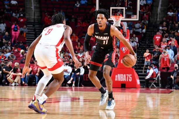 Okpala of the Miami Heat handles the ball during a preseason game against the Houston Rockets on October 7, 2021 at the Toyota Center in Houston,...