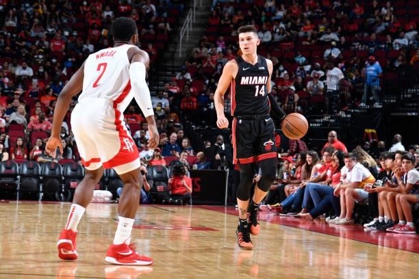 Tyler Herro of the Miami Heat dribbles the ball during a preseason game against the Houston Rockets on October 7, 2021 at the Toyota Center in...