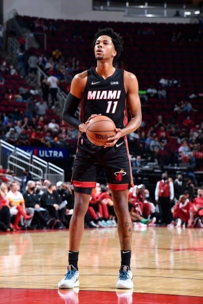 Okpala of the Miami Heat looks on during a preseason game against the Houston Rockets on October 7, 2021 at the Toyota Center in Houston, Texas. NOTE...