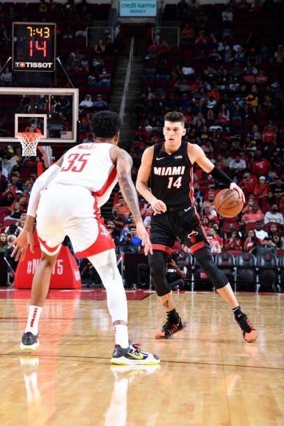 Tyler Herro of the Miami Heat handles the ball during a preseason game against the Houston Rockets on October 7, 2021 at the Toyota Center in...