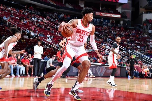 Christian Wood of the Houston Rockets handles the ball during a preseason game against the Miami Heat on October 7, 2021 at the Toyota Center in...