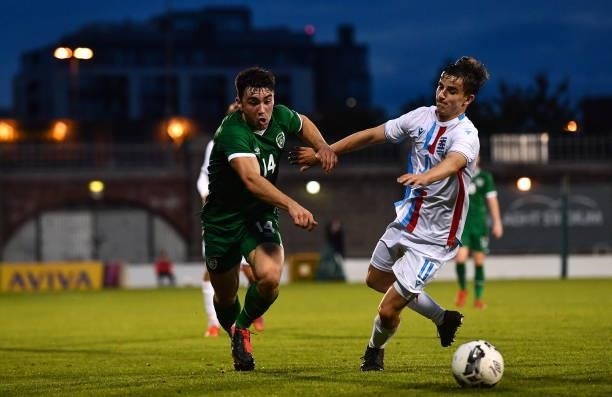 Dublin , Ireland - 8 October 2021; Liam Kerrigan of Republic of Ireland in action against Leon Schmit of Luxembourg during the UEFA European U21...