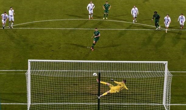 Dublin , Ireland - 8 October 2021; Conor Coventry of Republic of Ireland, shoots to score his side's second goal, a penalty, despite the efforts of...