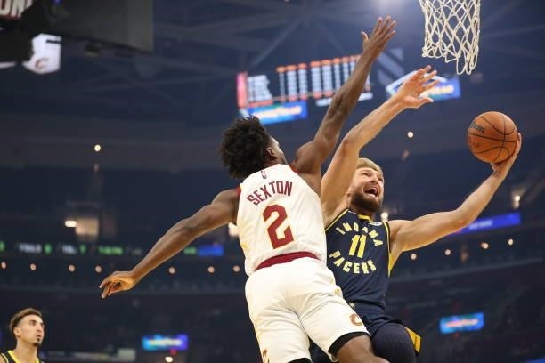 Domantas Sabonis of the Indiana Pacers drives to the basket during a preseason game against the Cleveland Cavaliers on October 8, 2021 at Rocket...
