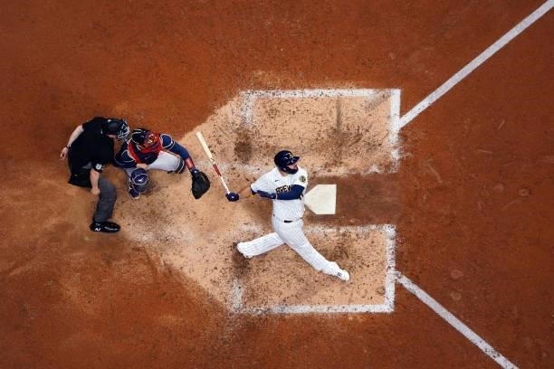 Rowdy Tellez of the Milwaukee Brewers hits a two-run home run in the seventh inning of Game 1 of the NLDS between the Atlanta Braves and the...
