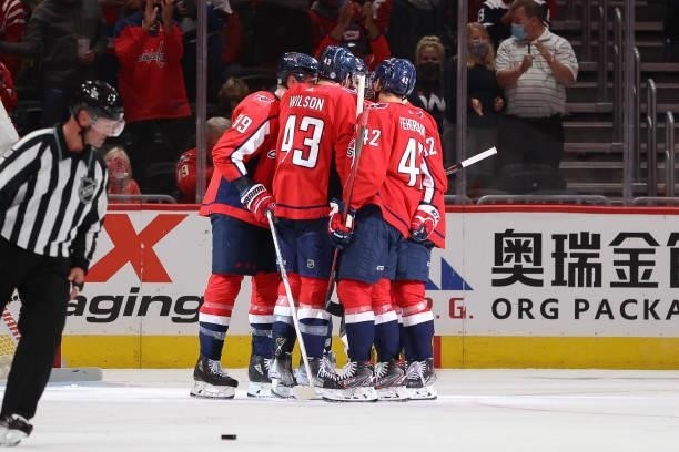 The Washington Capitals celebrate a second period goal during a game between the Philadelphia Flyers at Capital One Arena on October 8, 2021 in...