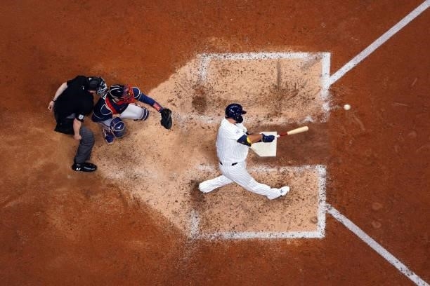 Rowdy Tellez of the Milwaukee Brewers hits a two-run home run in the seventh inning of Game 1 of the NLDS between the Atlanta Braves and the...