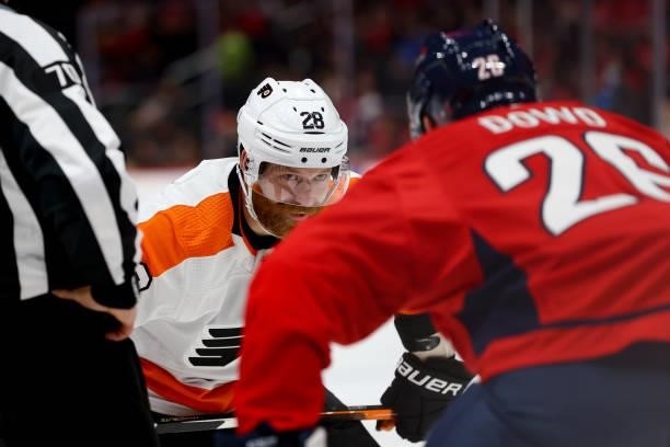 Philadelphia Flyers center Claude Giroux eyes up his competition for a face-off during a game between the Philadelphia Flyers at Capital One Arena on...