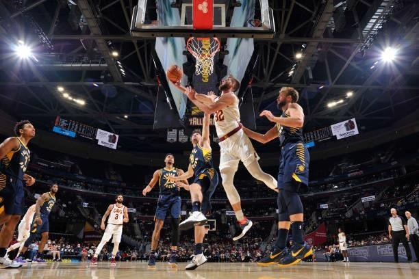 Dean Wade of the Cleveland Cavaliers drives to the basket during a preseason game against the Indiana Pacers on October 8, 2021 at Rocket Mortgage...