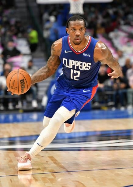 Eric Bledsoe of the LA Clippers drives to the basket during a preseason game against the Dallas Mavericks on October 8, 2021 at the American Airlines...
