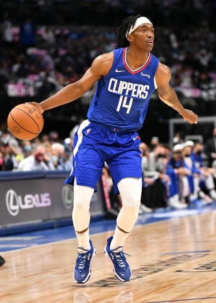 Terance Mann of the LA Clippers dribbles the ball during a preseason game against the Dallas Mavericks on October 8, 2021 at the American Airlines...