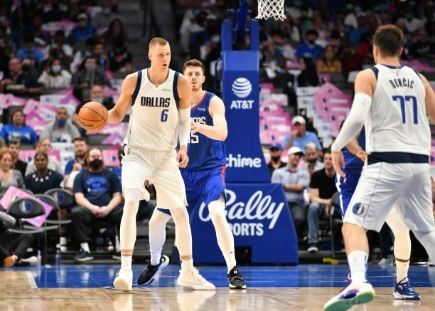 Kristaps Porzingis of the Dallas Mavericks handles the ball during a preseason game against the LA Clippers on October 8, 2021 at the American...