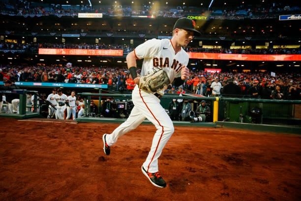Mike Yastrzemski of the San Francisco Giants enters the field prior to Game 1 of the NLDS between the Los Angeles Dodgers and the San Francisco...