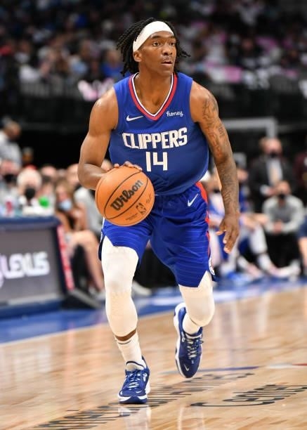 Terance Mann of the LA Clippers dribbles the ball during a preseason game against the Dallas Mavericks on October 8, 2021 at the American Airlines...