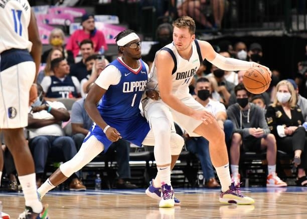 Luka Doncic of the Dallas Mavericks dribbles the ball during a preseason game against the LA Clippers on October 8, 2021 at the American Airlines...
