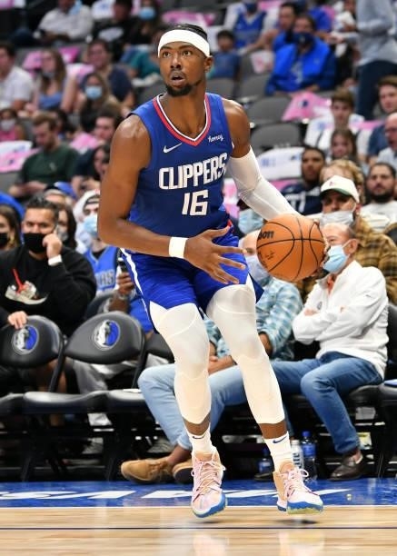 Harry Giles III of the LA Clippers handles the ball during a preseason game against the Dallas Mavericks on October 8, 2021 at the American Airlines...