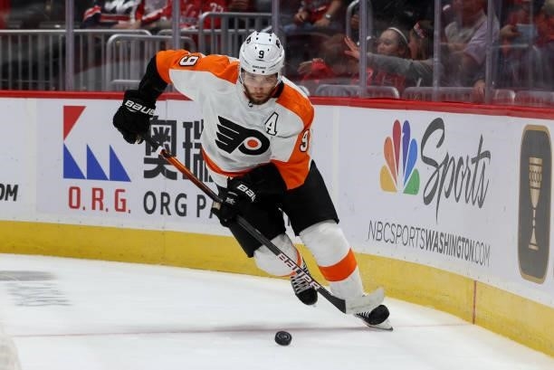 Philadelphia Flyers defenseman Ivan Provorov controls the puck behind his net during a game between the Philadelphia Flyers at Capital One Arena on...