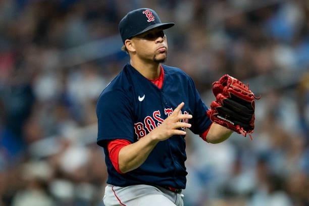 Hansel Robles of the Boston Red Sox reacts during the eighth inning of game two of the 2021 American League Division Series against the Tampa Bay...