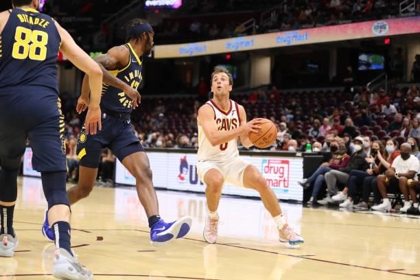 Kevin Pangos of the Cleveland Cavaliers handles the ball during a preseason game against the Indiana Pacers on October 8, 2021 at Rocket Mortgage...
