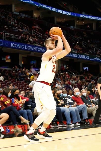 Dean Wade of the Cleveland Cavaliers shoots a three point basket during a preseason game against the Indiana Pacers on October 8, 2021 at Rocket...