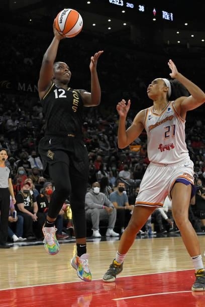 Chelsea Gray of the Las Vegas Aces drives to the basket during a preseason game against the Phoenix Mercury during Game Five of the 2021 WNBA...