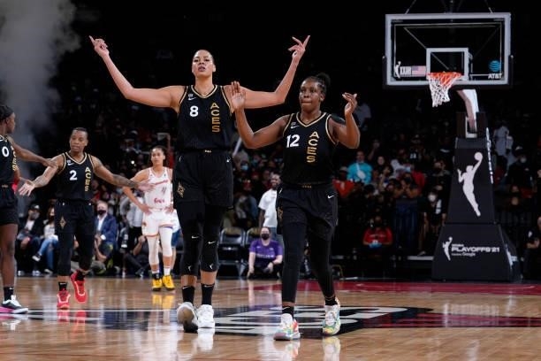 Liz Cambage and Chelsea Gray of the Las Vegas Aces celebrates during the game against the Phoenix Mercury during Game Five of the 2021 WNBA...