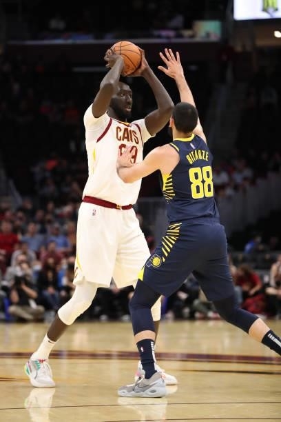 Tacko Fall of the Cleveland Cavaliers handles the ball during a preseason game against the Indiana Pacers on October 8, 2021 at Rocket Mortgage...
