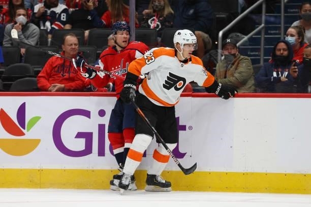 Washington Capitals right wing Daniel Sprong and Philadelphia Flyers left wing Oskar Lindblom collide during a game between the Philadelphia Flyers...