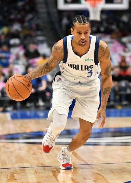 Trey Burke of the Dallas Mavericks dribbles the ball during a preseason game against the LA Clippers on October 8, 2021 at the American Airlines...