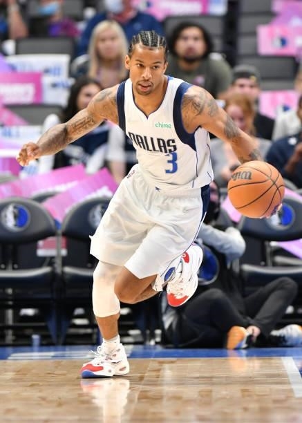 Trey Burke of the Dallas Mavericks dribbles the ball during a preseason game against the LA Clippers on October 8, 2021 at the American Airlines...