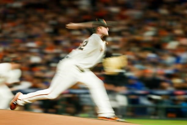 Logan Webb of the San Francisco Giants pitches during Game 1 of the NLDS between the Los Angeles Dodgers and the San Francisco Giants at Oracle Park...