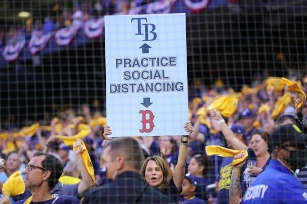 Fan holds a sign during Game 2 of the ALDS between the Boston Red Sox and the Tampa Bay Rays at Tropicana Field on Friday, October 8, 2021 in Tampa,...