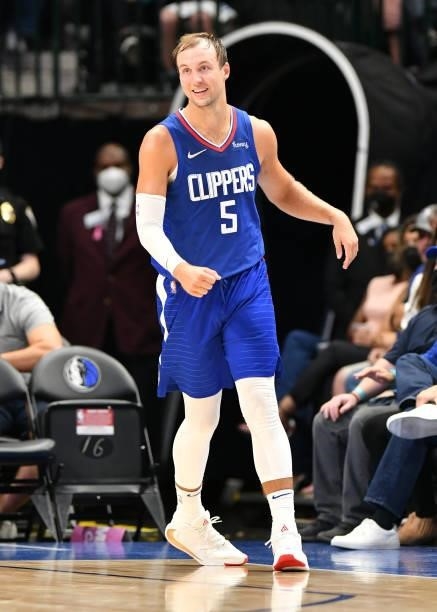 Luke Kennard of the LA Clippers looks on during a preseason game against the Dallas Mavericks on October 8, 2021 at the American Airlines Center in...