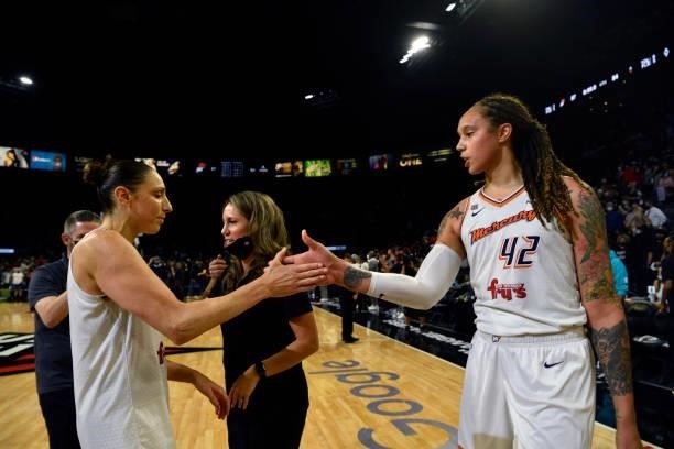 Diana Taurasi and Brittney Griner of the Phoenix Mercury celebrates after winning Game Five of the 2021 WNBA Semifinals against the Las Vegas Aces on...