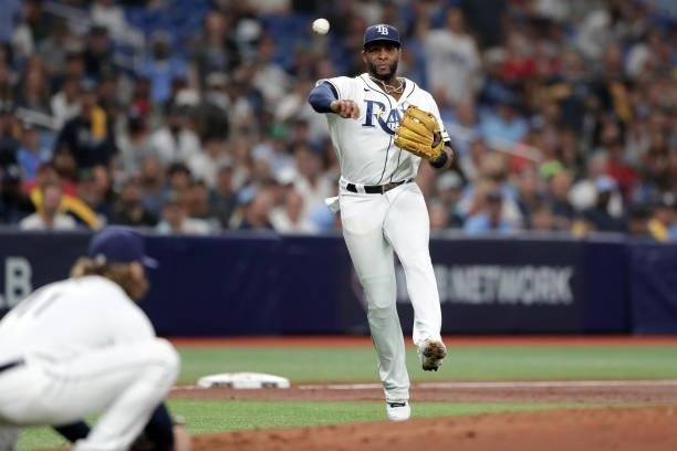 Yandy Díaz of the Tampa Bay Rays fields the ball in the second inning during Game 2 of the ALDS between the Boston Red Sox and the Tampa Bay Rays at...