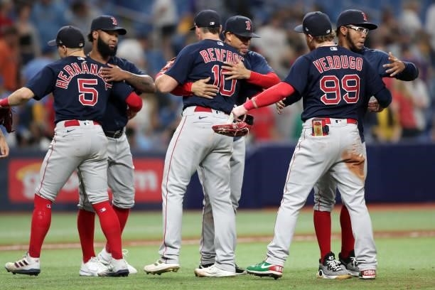 Enrique Hernández, Danny Santana, Hansel Robles, Hunter Renfroe, and Alex Verdugo of the Boston Red Sox celebrate after a 14-6 win in Game 2 of the...