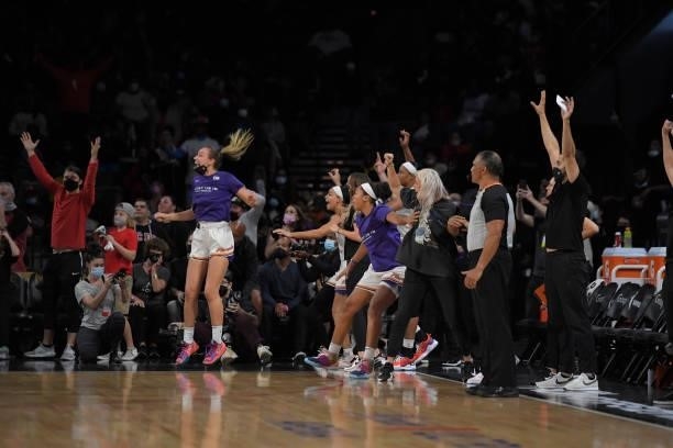 Sophie Cunningham and the Phoenix Mercury celebrates after winning Game Five of the 2021 WNBA Semifinals on October 8, 2021 at Michelob ULTRA Arena...