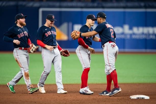 Alex Verdugo, Enrique Hernandez, Hunter Renfroe, and Xander Bogaerts of the Boston Red Sox celebrate a victory in game two of the 2021 American...