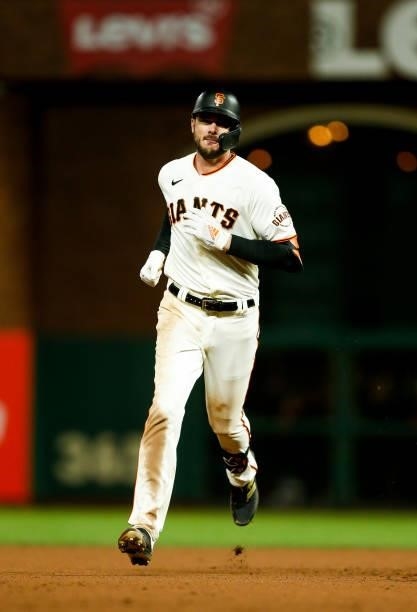 Kris Bryant of the San Francisco Giants runs the bases after hitting a solo home run in the seventh inning during Game 1 of the NLDS between the Los...