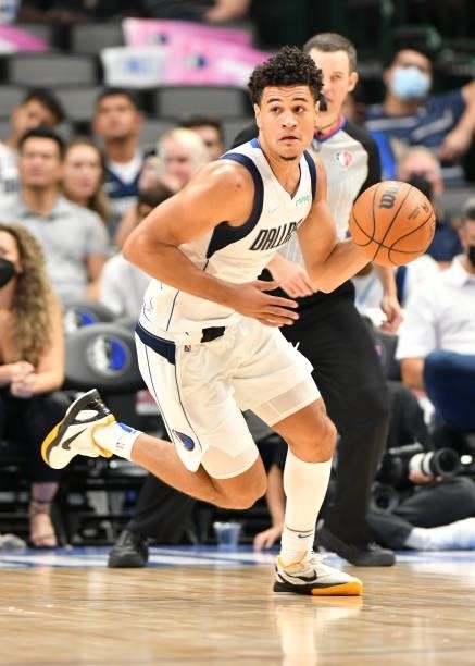 Josh Green of the Dallas Mavericks dribbles the ball during a preseason game against the LA Clippers on October 8, 2021 at the American Airlines...